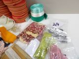 many different types of sewing supplies laid out on a table