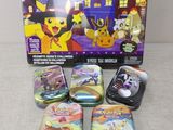 the pokemon tins are lined up on the table in front of the box