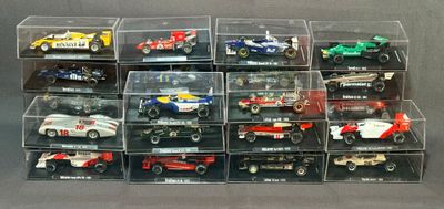 a lot of toy cars that are in a display case
