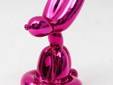 pink balloon rabbit sculpture on a white background