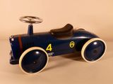 a blue toy car with a steering and a steering wheel