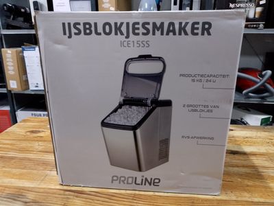 an image of a box of ice maker sitting on top of a wooden table