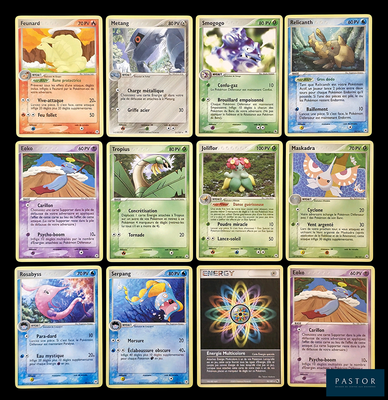 a lot of pokemon cards that are on the table