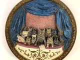 a picture of a picture of a group of cats on a bed
