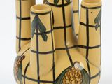 three vases with pineapples on them on a white background
