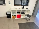 a television that is on in the corner of a room