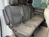 a car that has two seats in the back of it