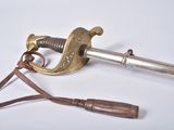 a very old looking sword with a leather strap