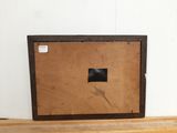 a picture of a wooden box on a shelf