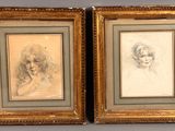 deux dessins encadrés représentant le visage d'une femme et la tête d'un homme