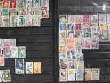 a lot of stamps on the wall of a building
