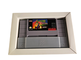 a nintendo game in a white box on a white surface