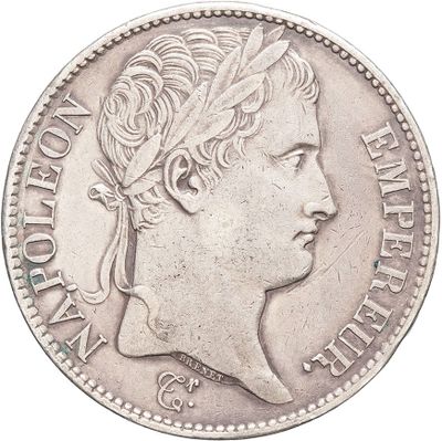 a close up of a coin with a woman ' s head on it