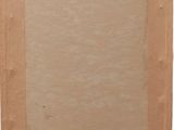 an empty piece of cardboard with a piece of paper attached to it
