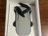 someone is opening up a box with a pair of scissors in it