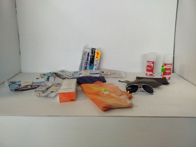 a white shelf with a lot of items on it