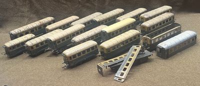 a lot of toy trains that are sitting on a table