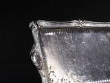 a silver tray that is sitting on a table