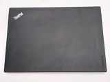 a black mouse pad on a white surface