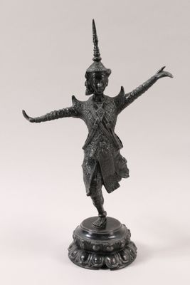 an image of a bronze statue of a man with his arms outstretched