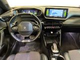 a picture of the interior of a car with a touch screen