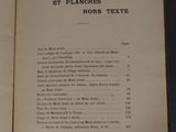an open book on a table with a number of pages