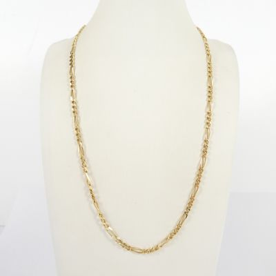 a gold chain necklace on a mannequin mannequin mannequin mannequin mannequin mannequin mannequin mannequin manne