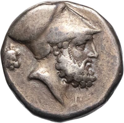 a close up of a coin with an image of a man on it