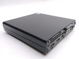 a black laptop sitting on top of a white table