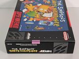 an image of a box of the simpsons game on a table