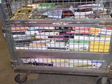 a metal cart with a lot of cigarettes in it
