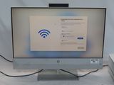 a computer monitor with a wifi sign on it