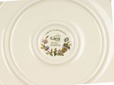 a plate with a picture of a bird on it