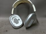 a pair of headphones sitting next to each other on the floor