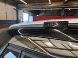 a sticker on the roof of a car in a garage