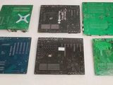 several pieces of electronic components are laid out on a white surface