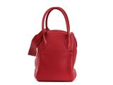 a red handbag with a bow on the handle