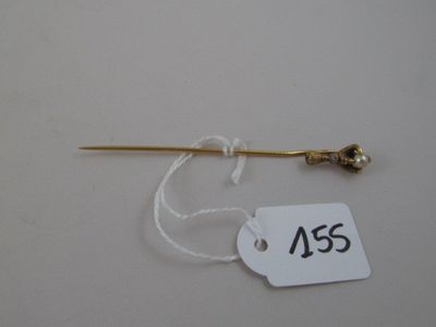 a picture of a needle with a price tag attached to it