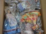 a cardboard box filled with stuffed animals in it