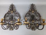 pair of wrought iron wall sconces with brass accents