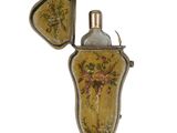 a picture of a lighter with a floral design on it