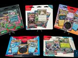 Plusieurs types de cartes à collectionner Pokémon sont présentés sur un fond noir.