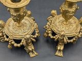 pair of antique brass candlesticks with angels and cherenshes