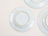 three plates that are sitting on a table
