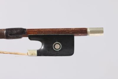 an image of a violin bow with a wooden handle on a white background