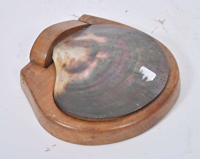 a wooden coaster with a picture of a dog on it