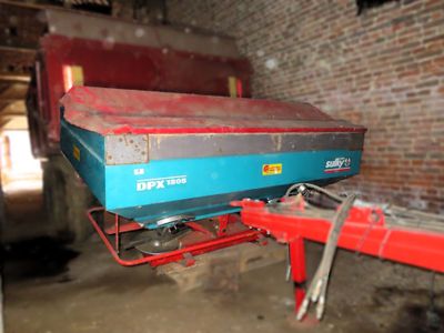 a blue box sitting on top of a red cart