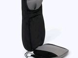 a black and gray bag with a remote control in it