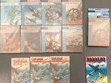 a lot of comic books that are on the table