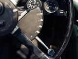 a close up of a steering wheel and dashboard of a car